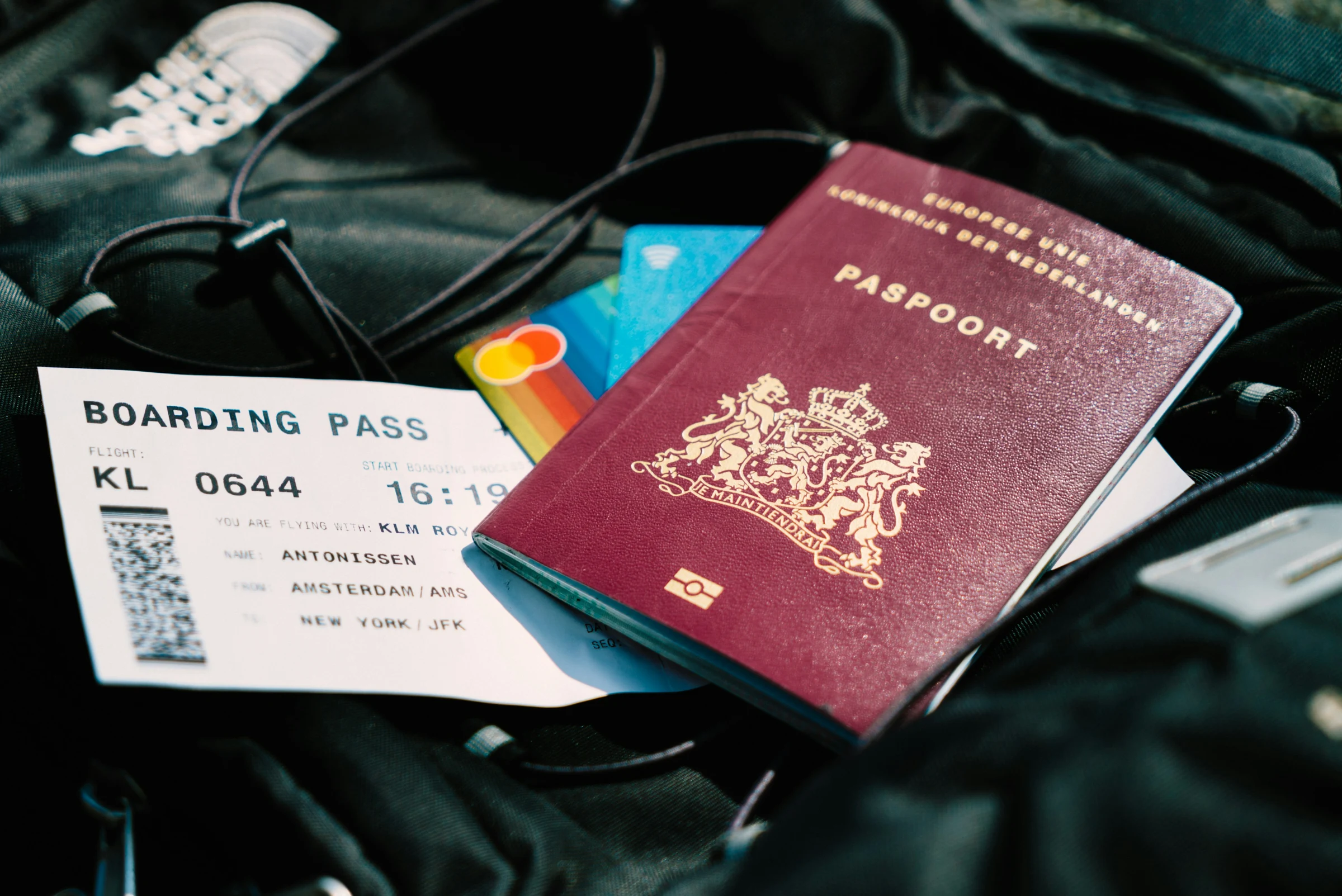 Two passports laid open side by side on a clean surface — the practical expression of international citizenship.