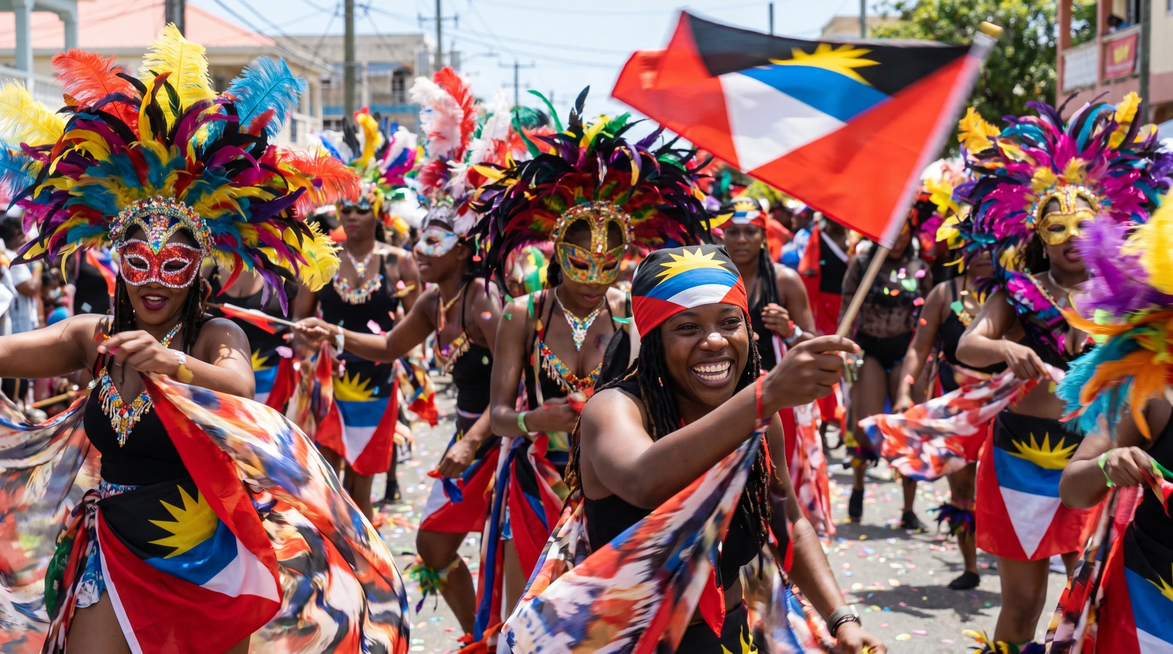 Masquerade troupes parading at Antigua Carnival in St John's — the annual celebration of emancipation that anchors the country's cultural calendar.